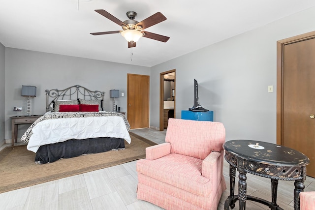 216 W Circuit Dr, Beaumont, TX 77706 - bedroom with a ceiling fan and baseboards