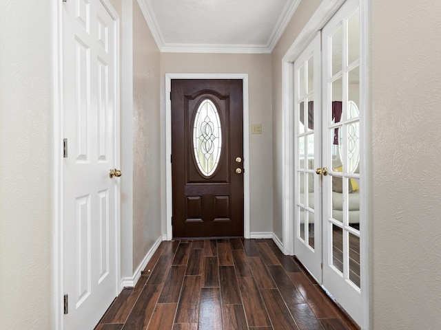 doorway featuring crown molding and french doors