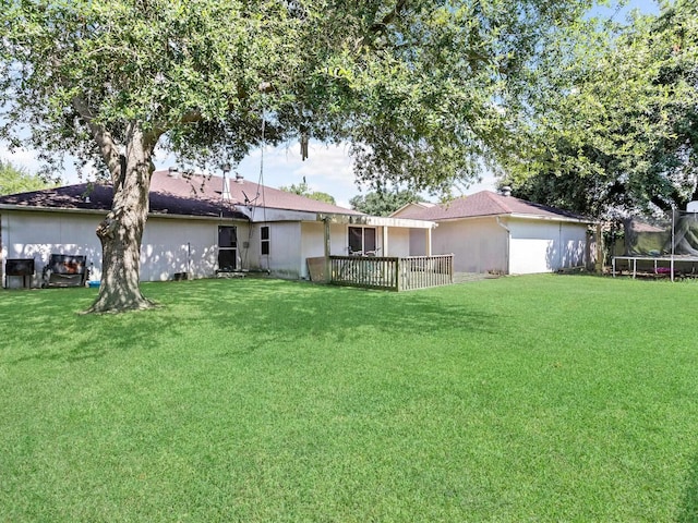 view of yard featuring a trampoline