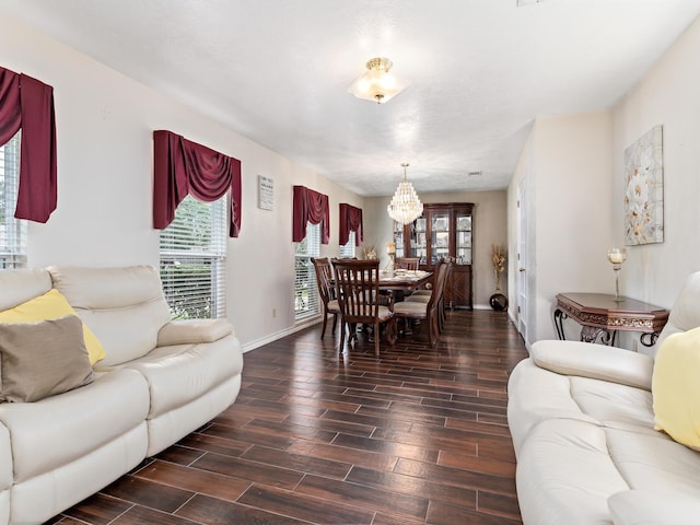 living room featuring a chandelier