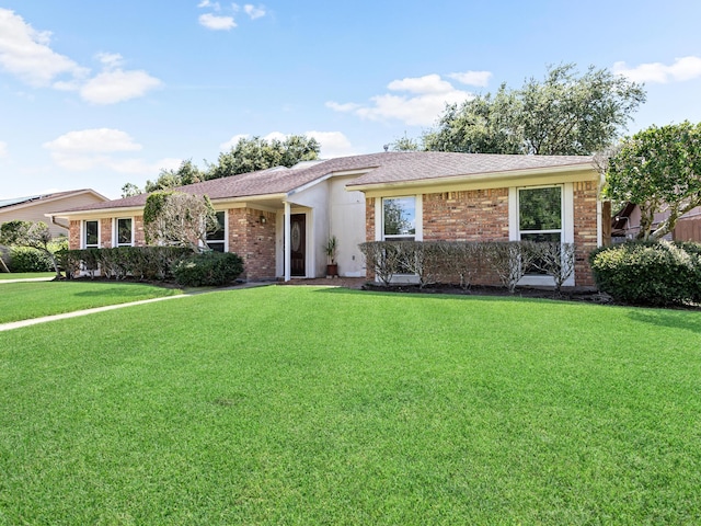 ranch-style house with a front yard