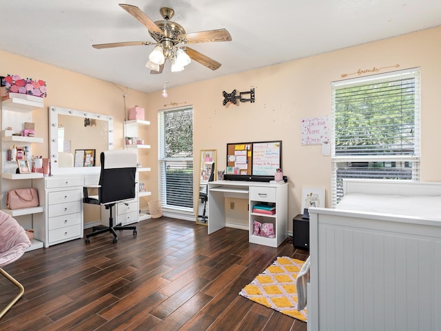 bedroom with multiple windows, ceiling fan, and dark hardwood / wood-style floors