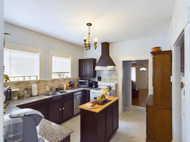 kitchen featuring stainless steel dishwasher, wall chimney exhaust hood, sink, white range with gas stovetop, and a center island