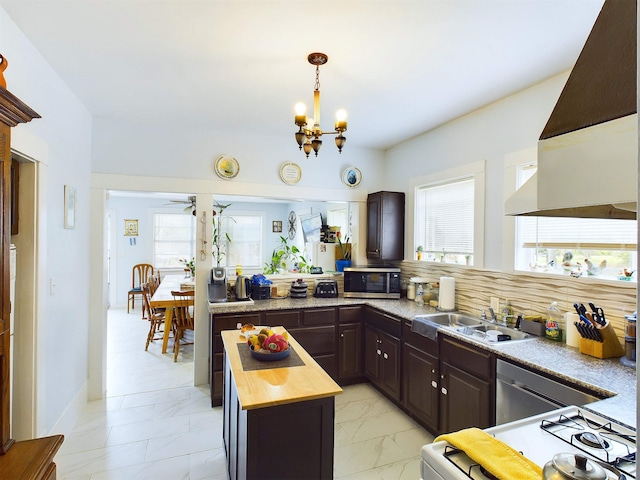 kitchen with sink, range hood, white range, butcher block countertops, and decorative backsplash