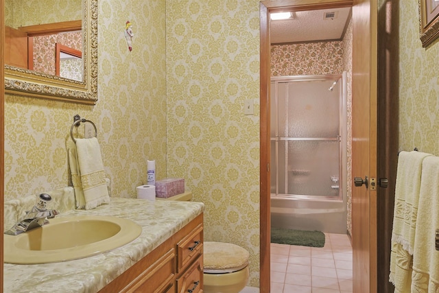 4425 Cartwright St, Beaumont, TX 77707 - bathroom featuring vanity, toilet, wallpapered walls, tub / shower combination, and tile patterned floors