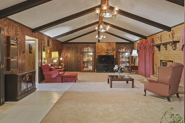 4425 Cartwright St, Beaumont, TX 77707 - living area with wooden walls, a chandelier, a fireplace, tile patterned flooring, and a textured ceiling