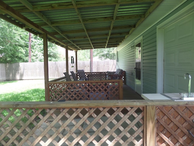 7035 Carroll Ln, Beaumont, TX 77713 - wooden terrace featuring fence