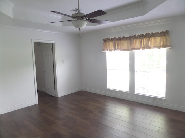 7035 Carroll Ln, Beaumont, TX 77713 - unfurnished room with crown molding, a raised ceiling, a ceiling fan, wood finished floors, and baseboards