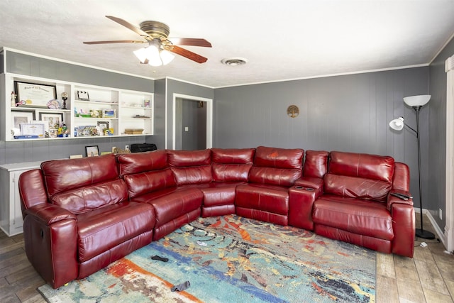 4715 Regina Ln, Beaumont, TX 77706 - living area featuring hardwood / wood-style floors, ceiling fan, and ornamental molding