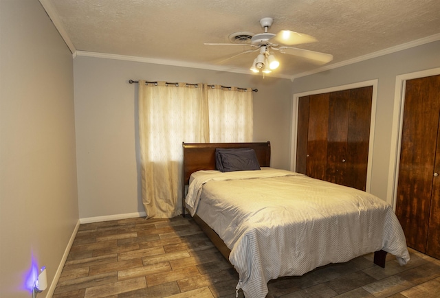 4715 Regina Ln, Beaumont, TX 77706 - bedroom featuring hardwood / wood-style floors, ornamental molding, a textured ceiling, a ceiling fan, and multiple closets