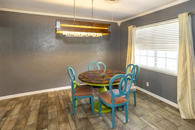 4715 Regina Ln, Beaumont, TX 77706 - dining space featuring wood finished floors and ornamental molding