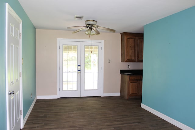619 Carolyn St, Winnie, TX 77665 - doorway to outside featuring french doors, ceiling fan, and dark wood-type flooring