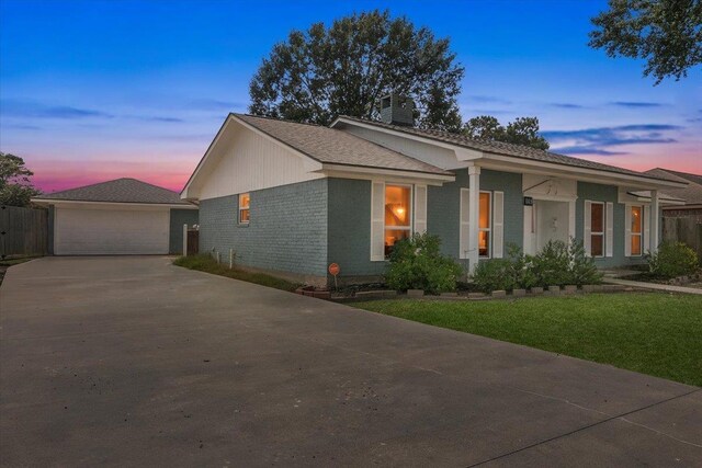 view of front of house with a lawn