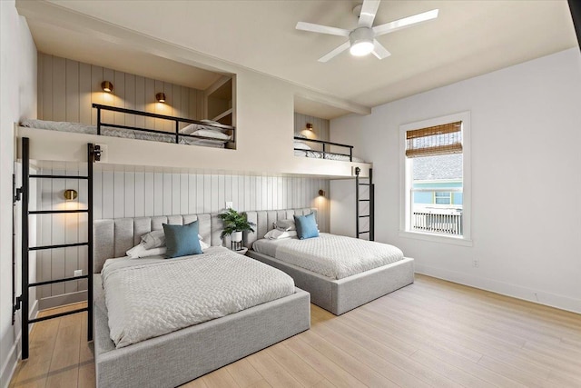 bedroom featuring ceiling fan and light hardwood / wood-style flooring