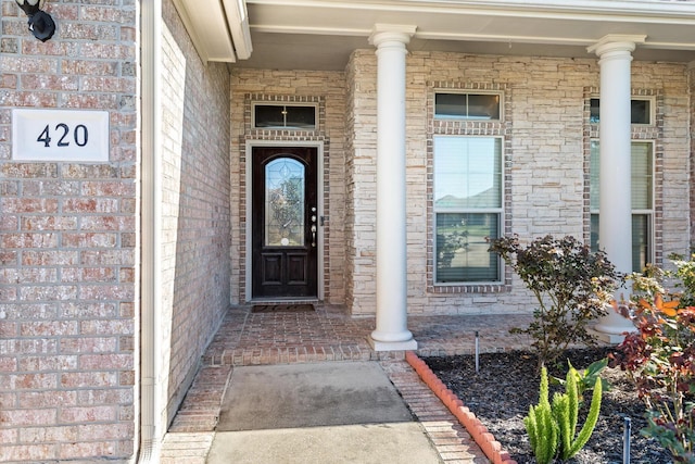 doorway to property featuring a porch