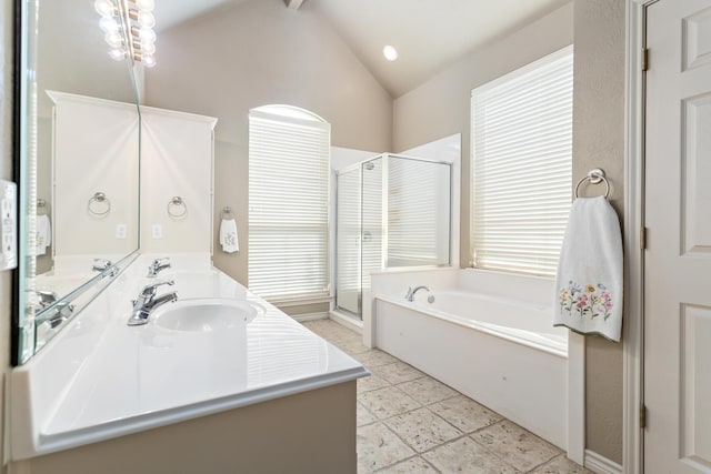 bathroom with vaulted ceiling with beams, vanity, and plus walk in shower