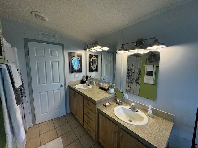 bathroom featuring tile patterned flooring, crown molding, lofted ceiling, a textured ceiling, and vanity