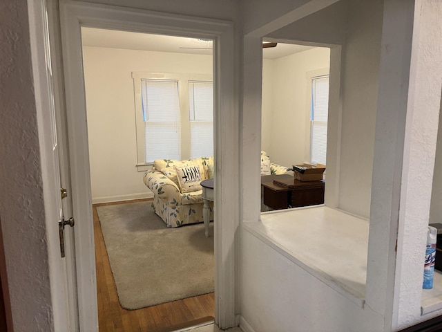4609 Alamosa St, Port Arthur, TX 77642 - hallway featuring wood finished floors and baseboards
