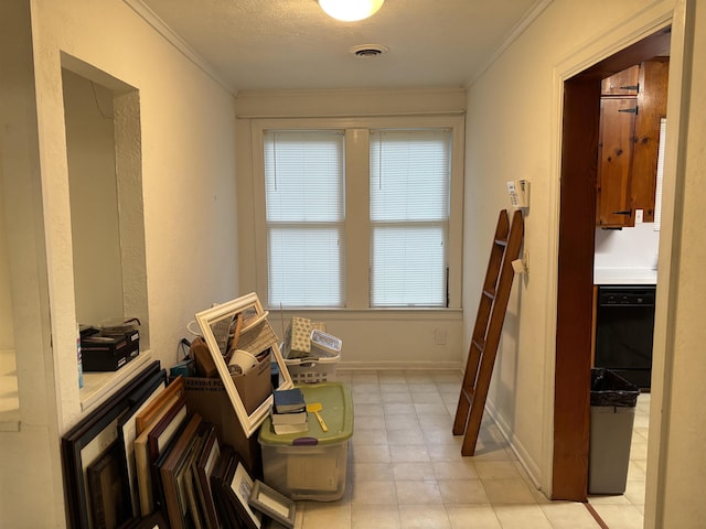 4609 Alamosa St, Port Arthur, TX 77642 - bathroom with healthy amount of natural light, ornamental molding, and baseboards