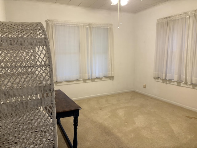 4609 Alamosa St, Port Arthur, TX 77642 - unfurnished room featuring carpet floors, baseboards, and a ceiling fan