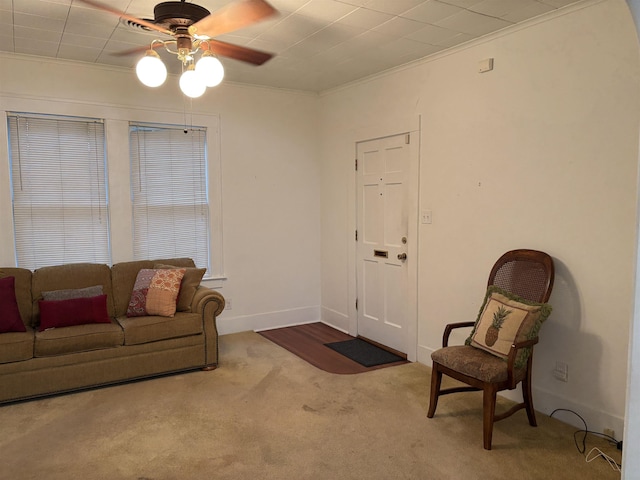 4609 Alamosa St, Port Arthur, TX 77642 - living area with a ceiling fan, crown molding, and carpet flooring