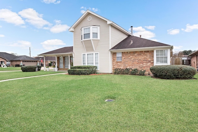 view of front of property with a front lawn