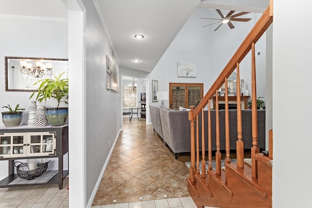 corridor with a chandelier, light tile patterned floors, vaulted ceiling, and crown molding