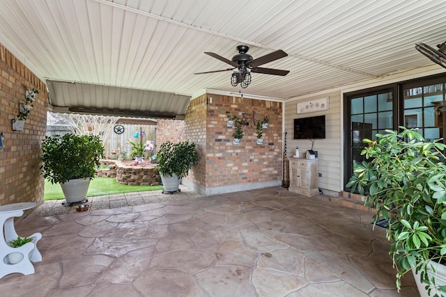 view of patio with ceiling fan