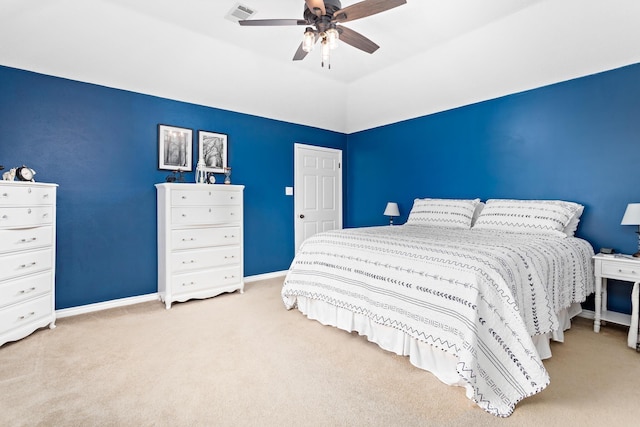 bedroom featuring ceiling fan, carpet floors, and vaulted ceiling