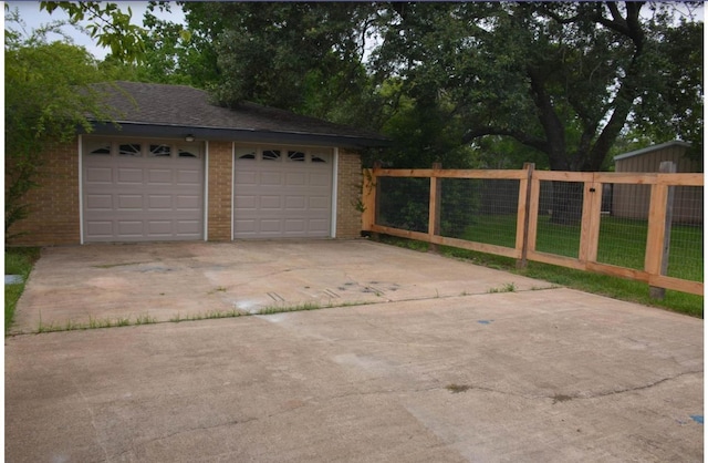 garage with a yard