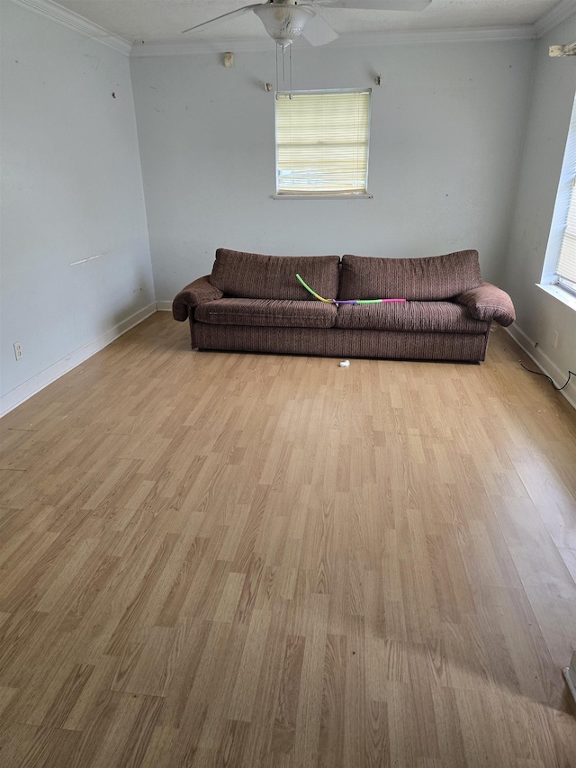 1610 Cartwright Ave, Beaumont, TX 77701 - sitting room featuring wood finished floors, ceiling fan, crown molding, and baseboards