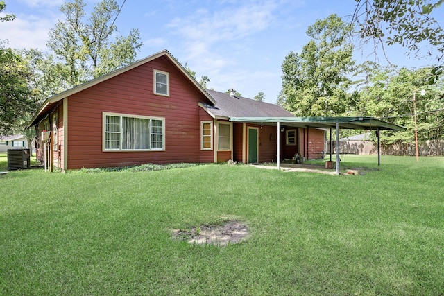 3785 Stanley Dr, Vidor, TX 77662 - back of property featuring a yard