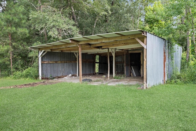 3785 Stanley Dr, Vidor, TX 77662 - view of pole building with a yard