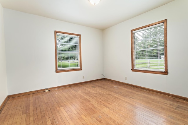 3785 Stanley Dr, Vidor, TX 77662 - unfurnished room with light wood-style flooring and baseboards