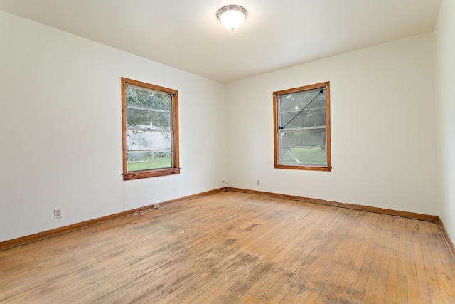 3785 Stanley Dr, Vidor, TX 77662 - empty room featuring light wood-style flooring and baseboards