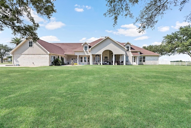 view of front facade with a front lawn