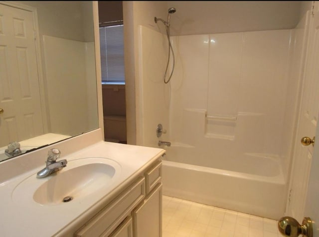 bathroom featuring vanity and shower / tub combination