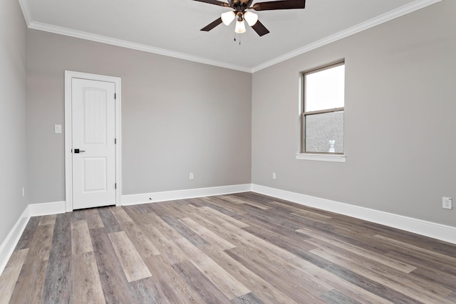 7705 Water Edge, Beaumont, TX 77707 - unfurnished room featuring ceiling fan, crown molding, baseboards, and wood finished floors