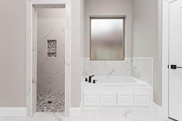 7705 Water Edge, Beaumont, TX 77707 - full bath featuring a garden tub, a marble finish shower, marble finish floors, and baseboards