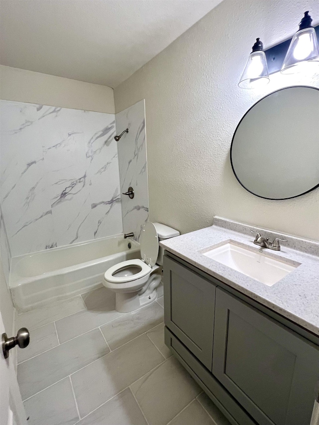 265 W Hartel St, Sour Lake, TX 77659 - bathroom featuring vanity, toilet, marble finish floors,  shower combination, and a textured wall