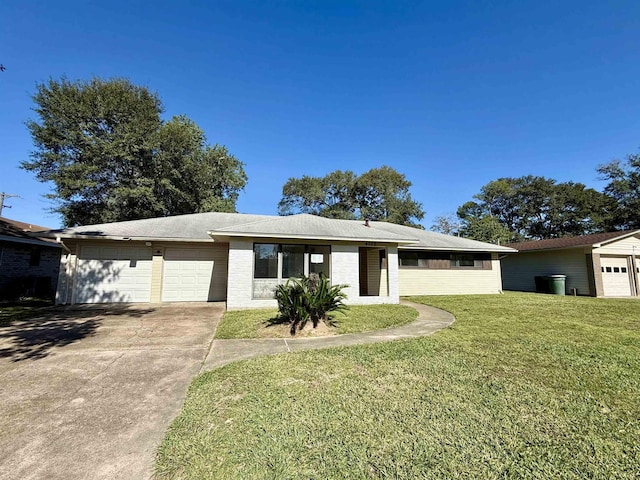 ranch-style home featuring a front yard and a garage