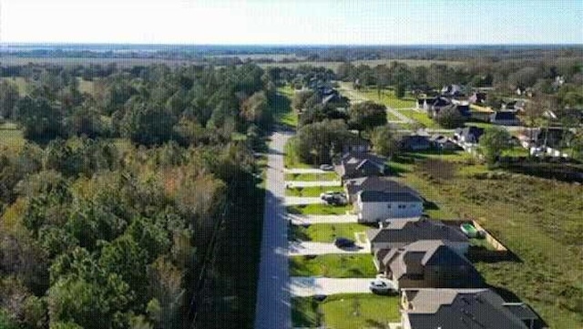 100 Country Club Dr, Beaumont, TX 77705 - birds eye view of property with a view of trees