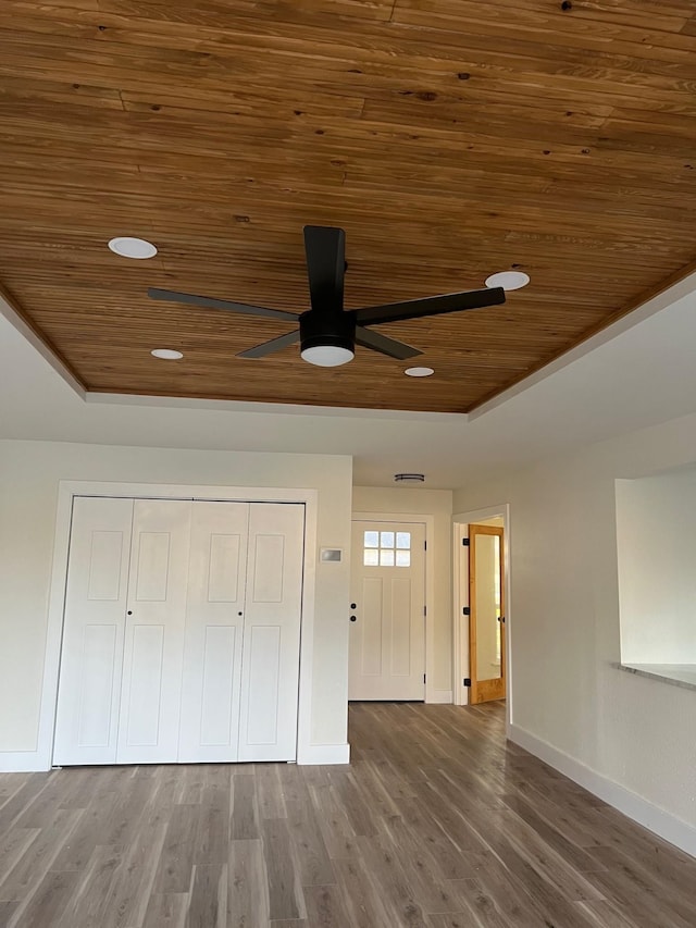100 Country Club Dr, Beaumont, TX 77705 - interior space featuring a ceiling fan, baseboards, wooden ceiling, and wood finished floors