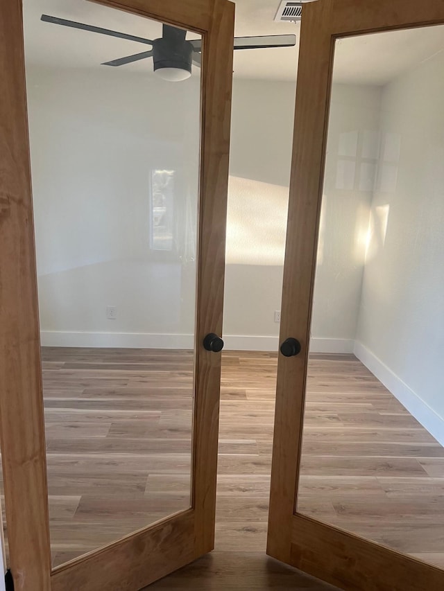 100 Country Club Dr, Beaumont, TX 77705 - interior space with baseboards, ceiling fan, and wood finished floors