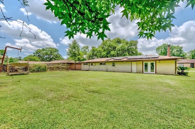 175 Triangle Dr, Vidor, TX 77662 - view of yard featuring french doors