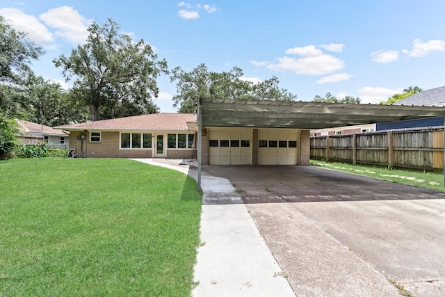 single story home with a front yard and a carport