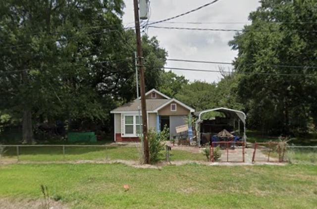 320 W Railroad Ave, China, TX 77613 - view of yard with a detached carport and an outbuilding