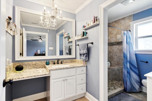 5880 Longwood St, Beaumont, TX 77707 - full bathroom featuring vanity, tiled shower, toilet, ceiling fan, and a chandelier