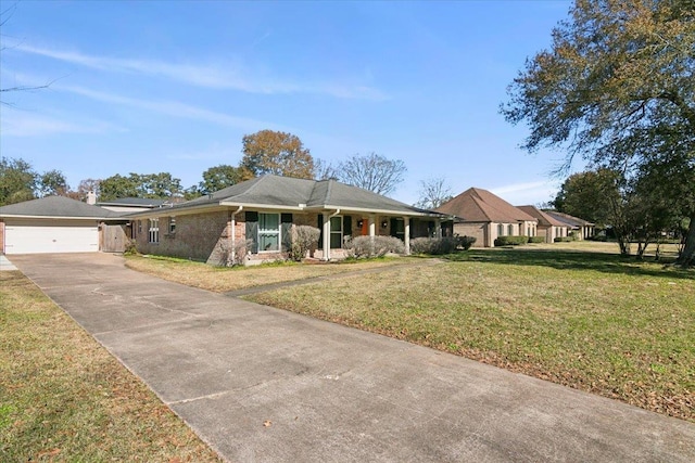 5880 Longwood St, Beaumont, TX 77707 - single story home with concrete driveway, a front lawn, brick siding, and an attached garage