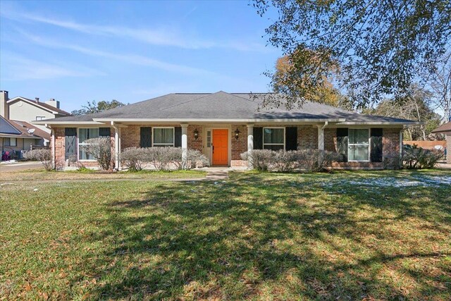 5880 Longwood St, Beaumont, TX 77707 - single story home with brick siding and a front yard